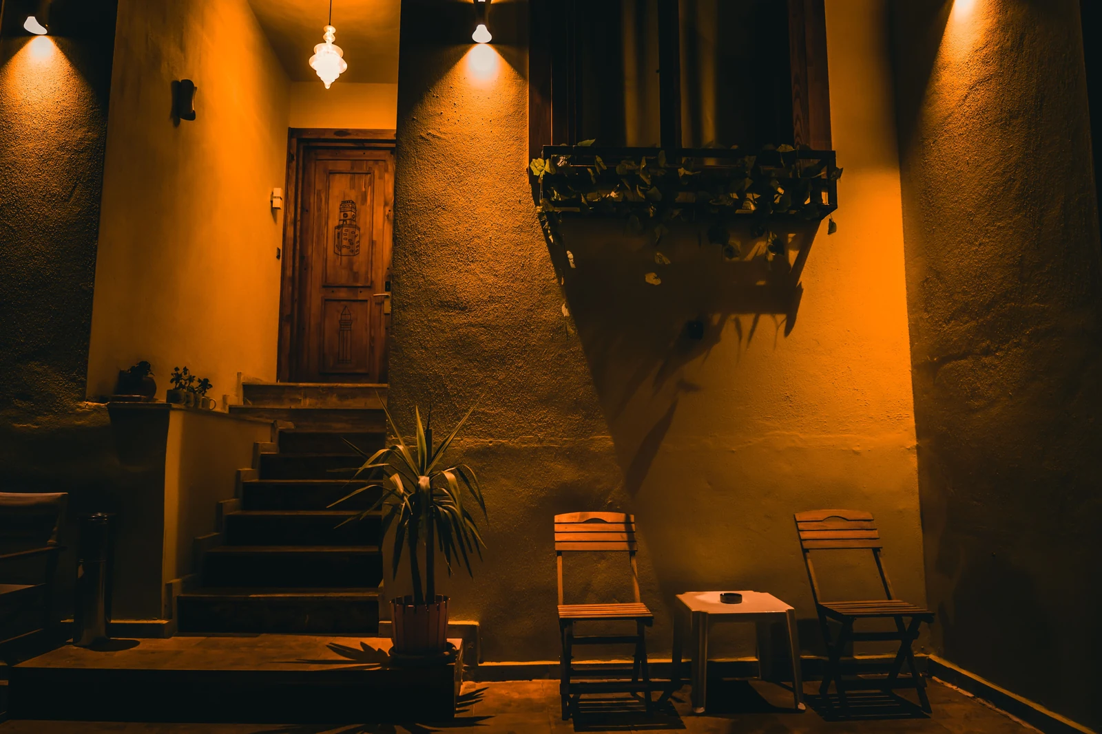 Two chairs and a warm glow: a corner with a little cinematic magic