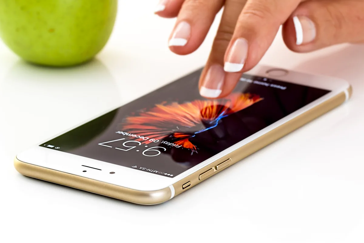 Smartphone in use; illustrative photograph, not a storage-settings screenshot. PxHere / Wikimedia Commons (author unknown), CC0.