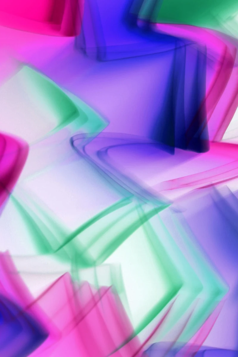 Soft abstract trails and translucent shapes in pink, purple and green